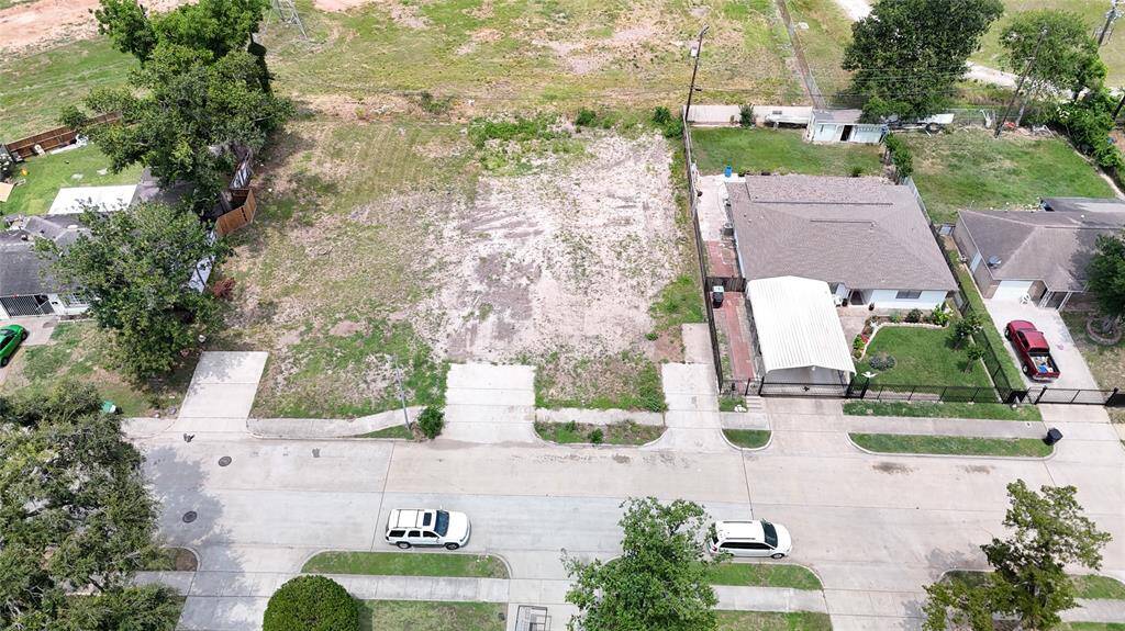 Left half of cleared lots one driveway to left