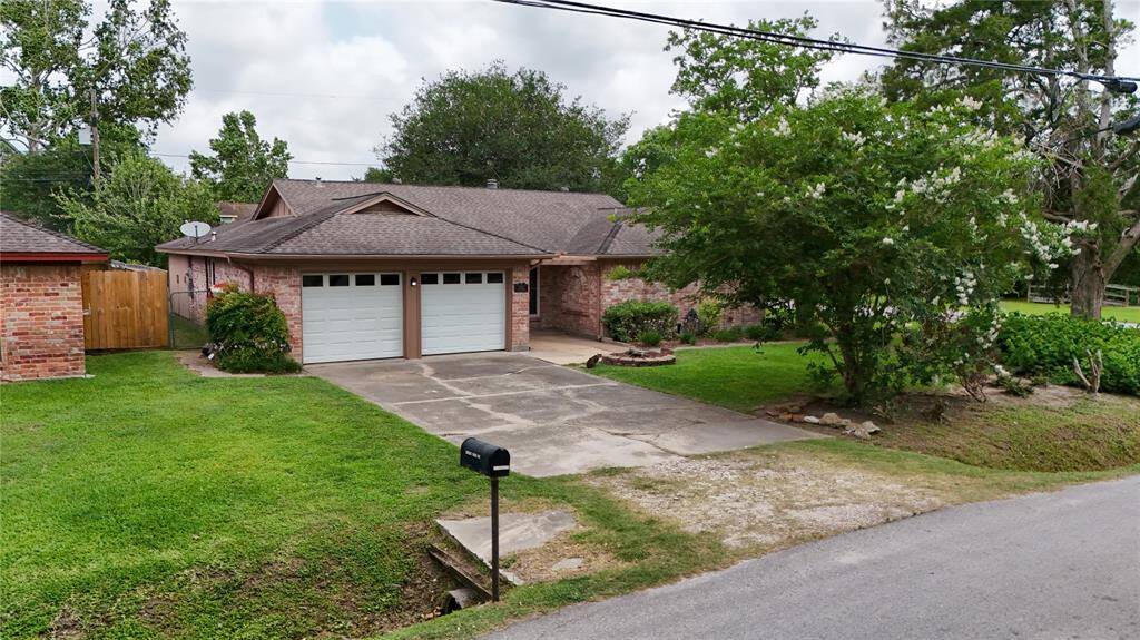 Double Wide Driveway! 2 Car Garage