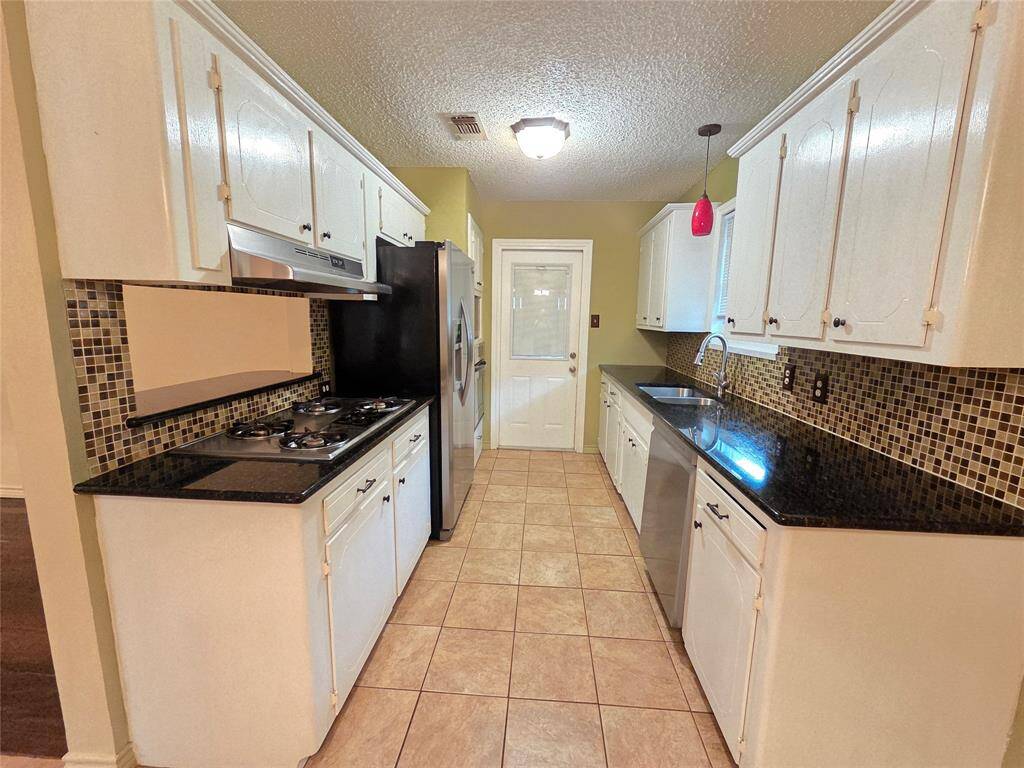 Kitchen with all appliances staying. Undermount sink also!