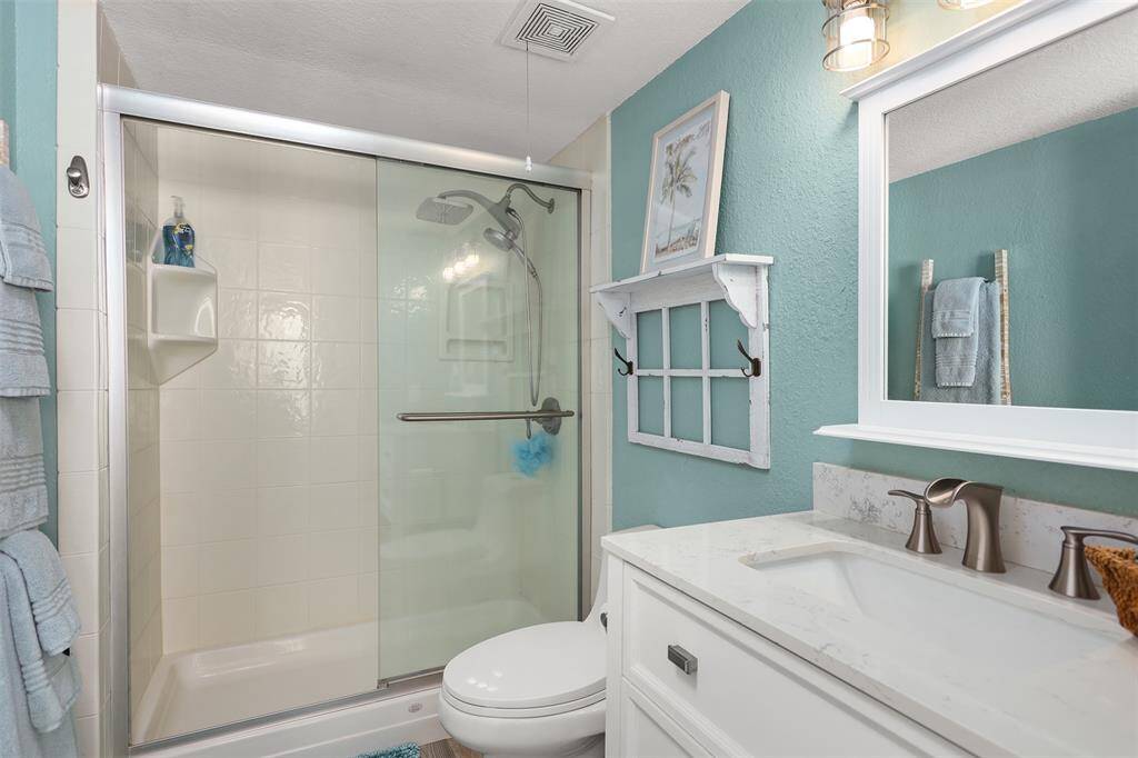Primary bath has a large walk-in shower.