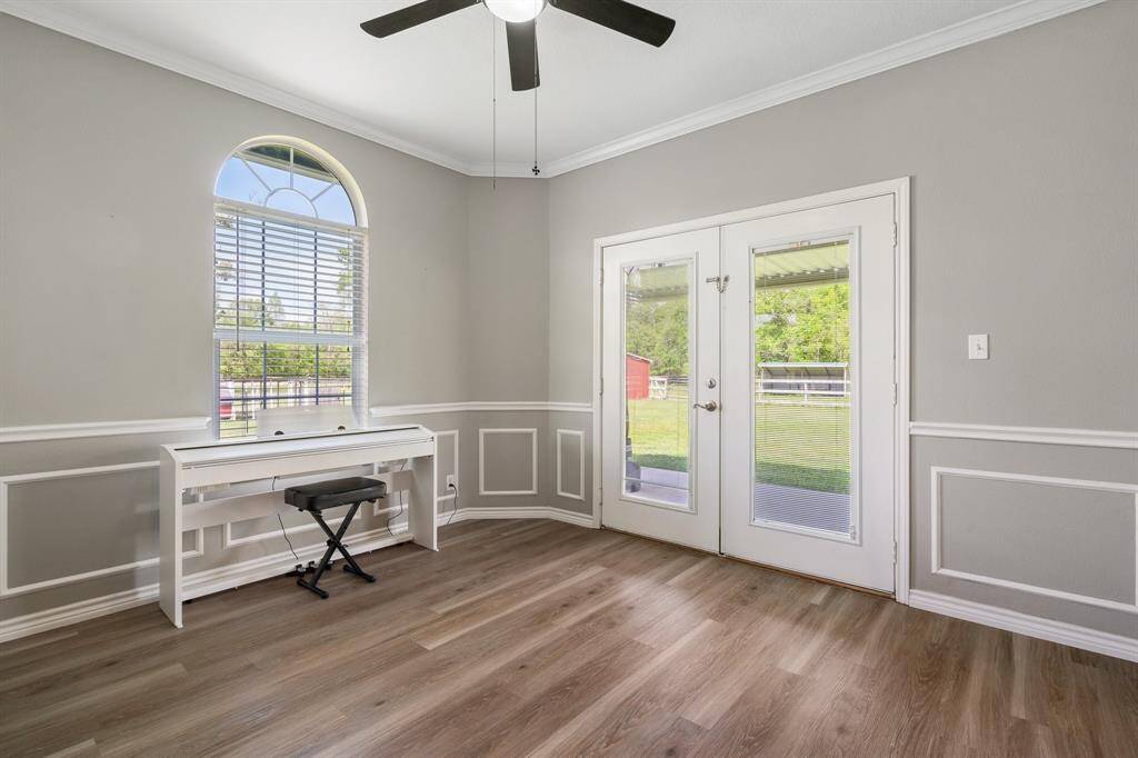 Dining room is located off the kitchen with access to the wrap aorund porch.