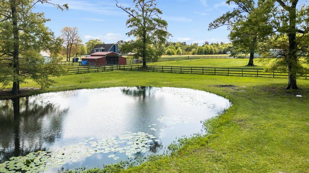 Enjoy your own stocked pond at the back pasture of the property.