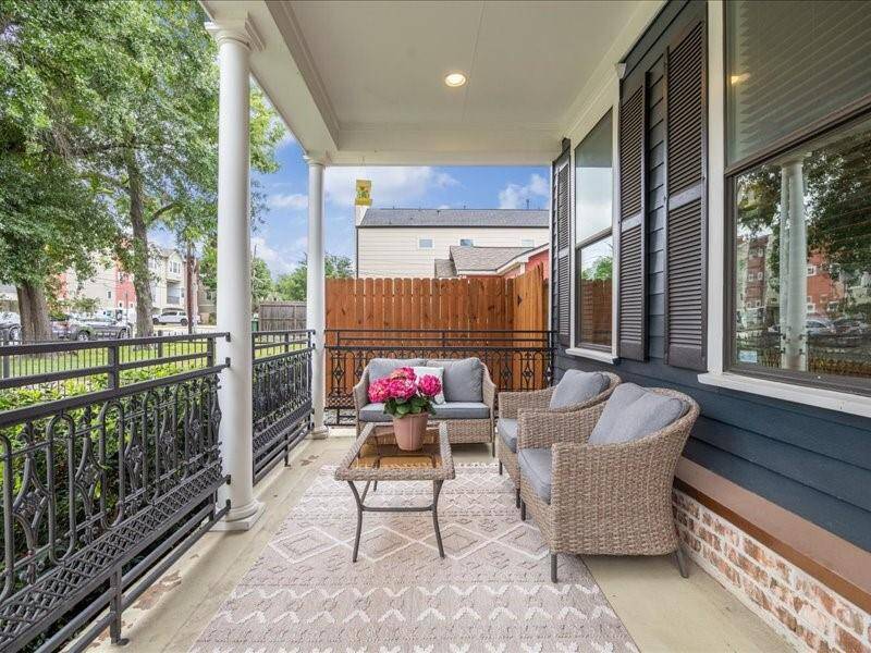 Front patio overlooks the beautiful front grounds.