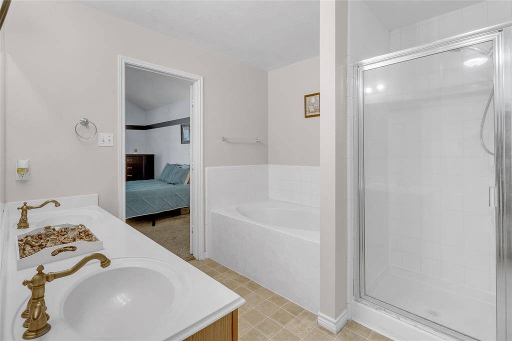 Dual-function bath: sleek tub-shower combination.