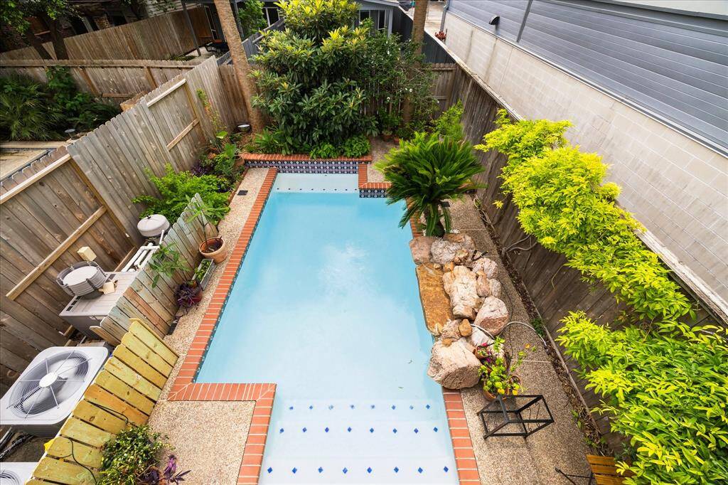 Escape the Houston heat with your own refreshing pool oasis.