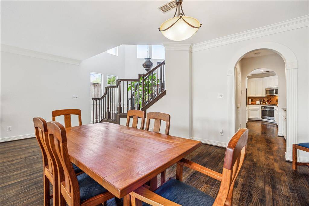 Seamlessly flow from the dining room to the butler's pantry and kitchen.