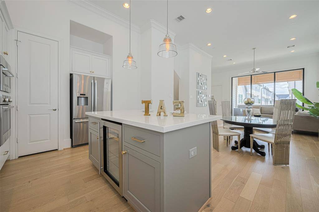 The roomy walk-in pantry is shown in the background.
