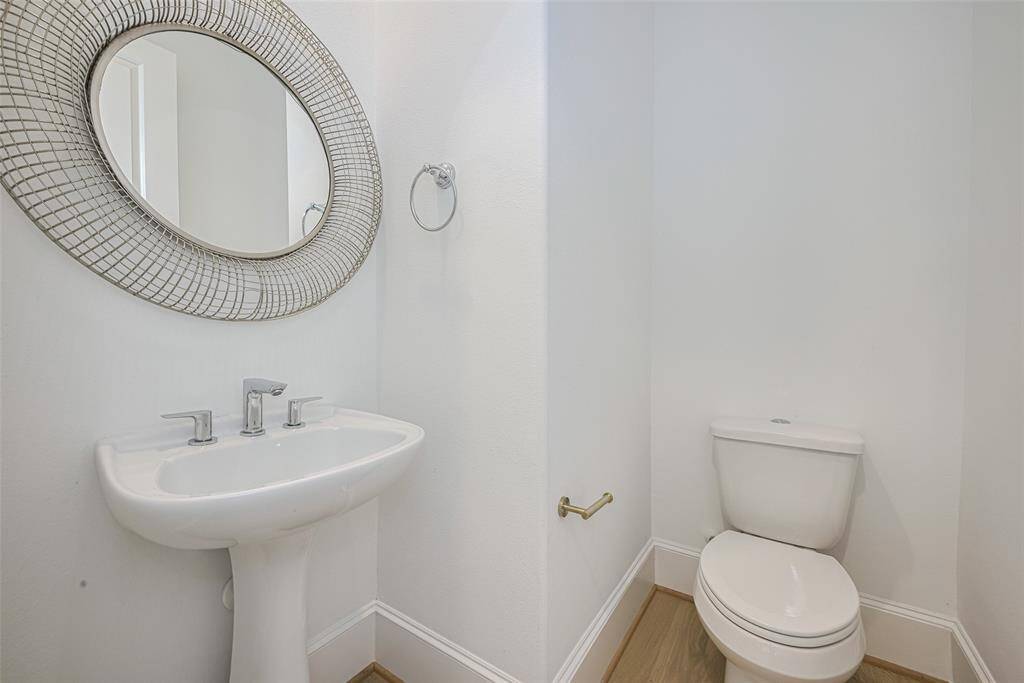 Powder room located on the second floor at the top of the stairs -- and not opposite dining or kitchen -- a good thing!