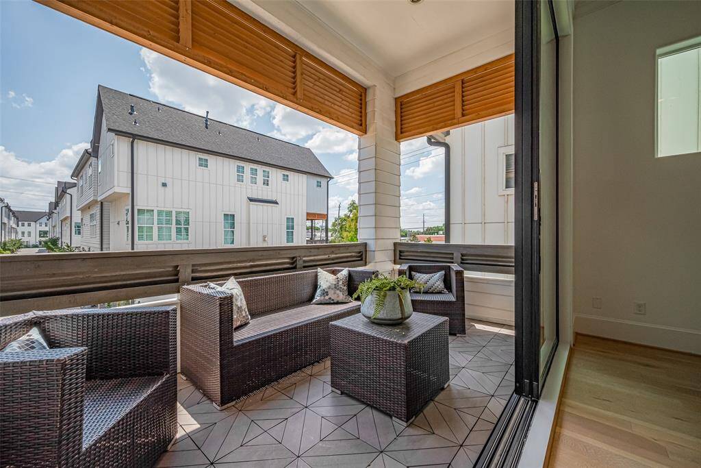 Container gardening would do very well here with this east-facing balcony -- and it's a large one!
