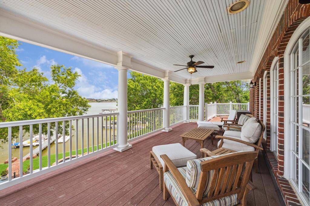 This top floor balcony spans the length of the back of the house!  Access it from the game room or the 2nd bedroom.  Incredible VIEW!
