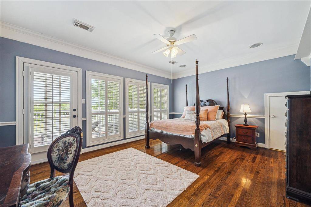 Huge 2nd bedroom with access to top floor balcony, walk in closet with cedar ceiling, and jack and jill bathroom with private vanity.