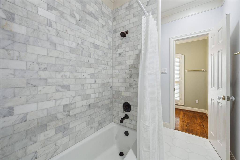 Jack and Jill shower area with recently updated tile and fixtures.