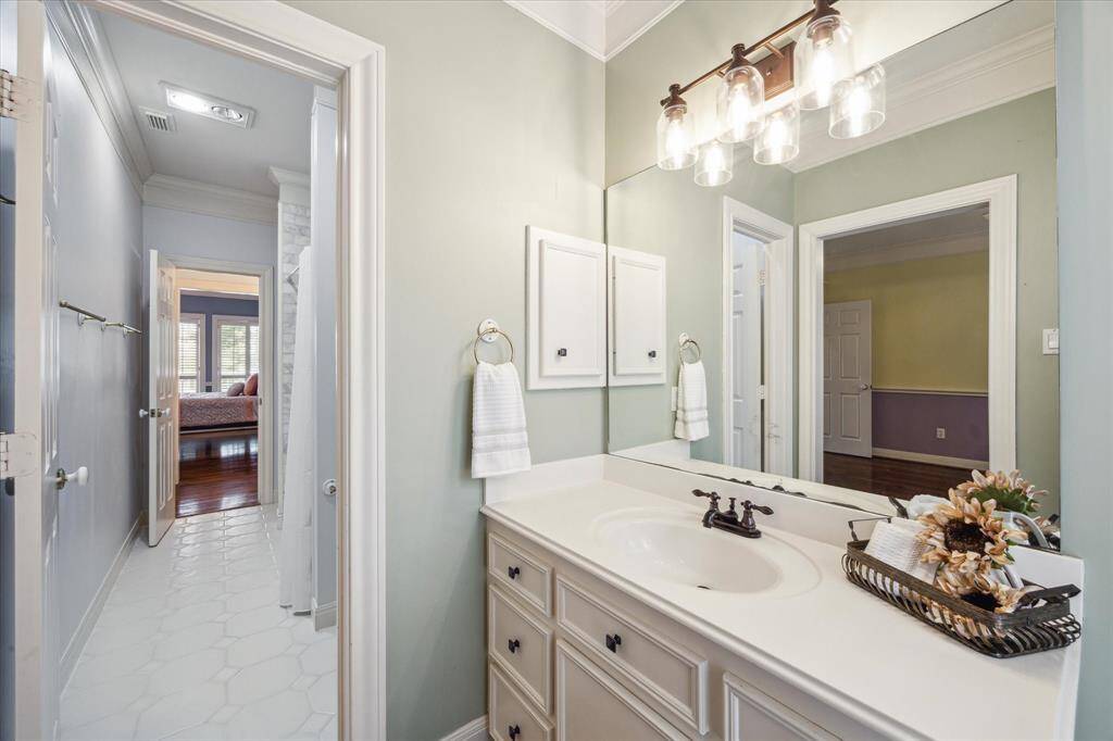 Vanity for 3rd bedroom with updated fixtures.