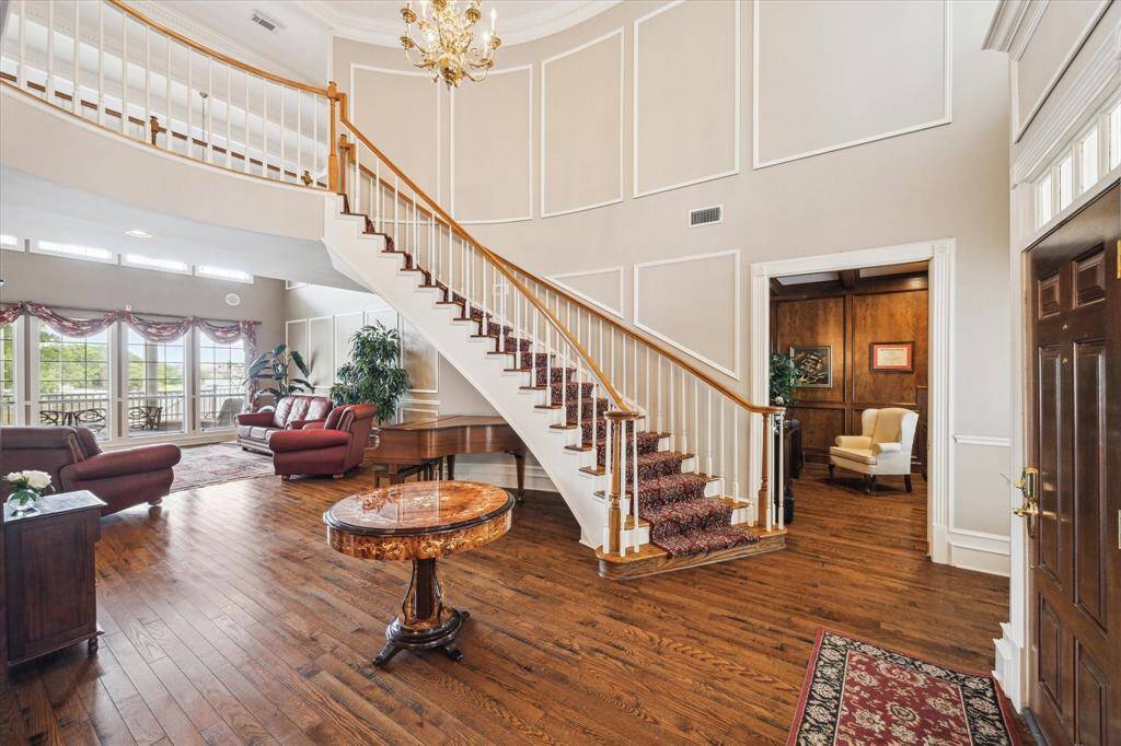 Welcome Home! This grand foyer and staircase will be the best spot for future family photos and prom pics! Gorgeous hardwoods installed in 2024.