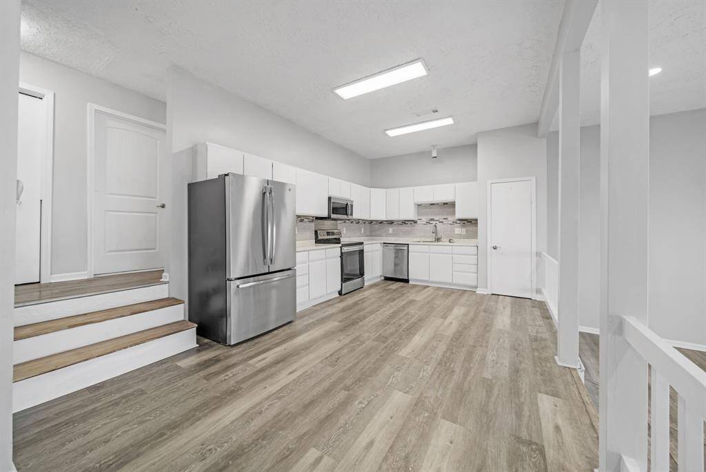 Kitchen features ample cabinetry