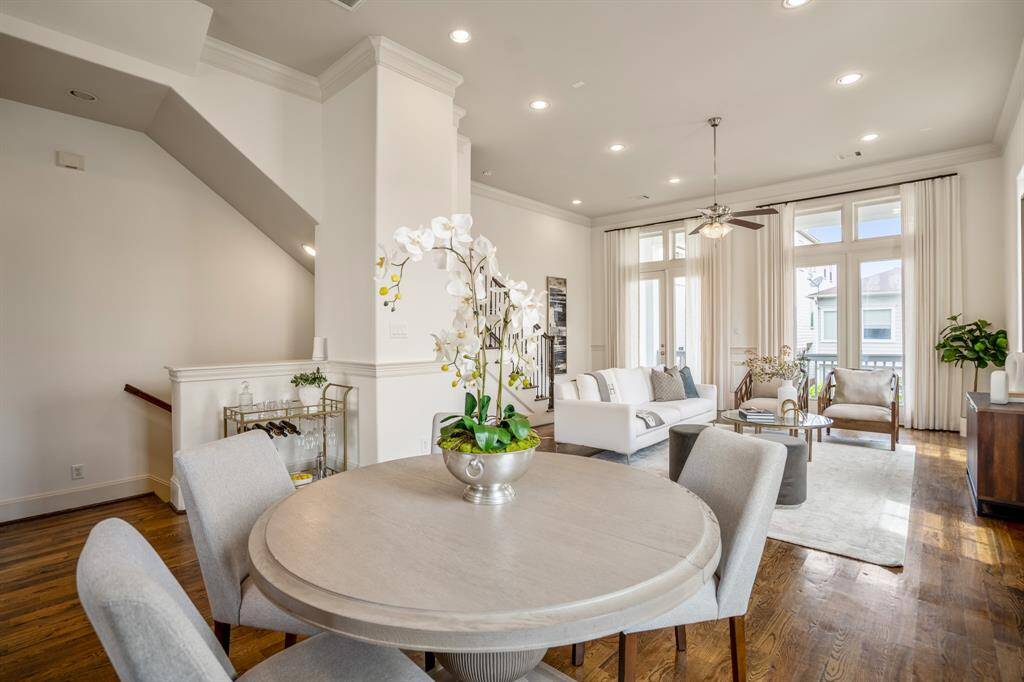 Soaring ceilings and natural light make this living room the heart of the home.