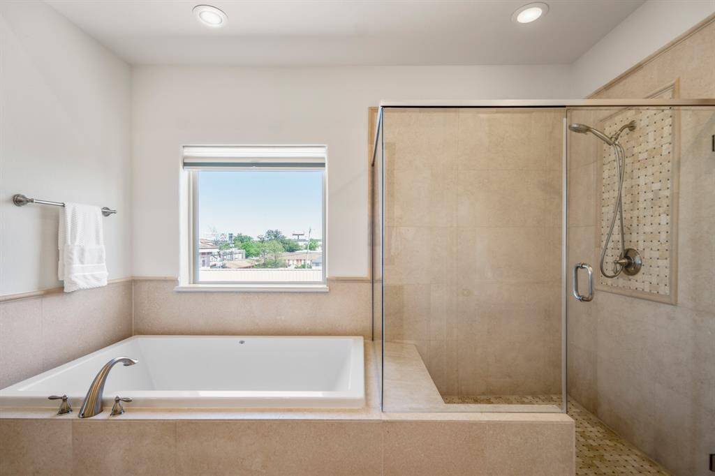 The second bedroom offers versatility—ideal as a guest room, office, or nursery.