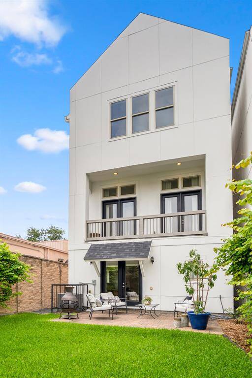 Private backyard retreat with plenty of room to entertain, play, or relax.