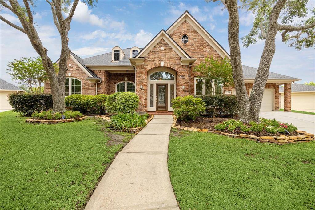 Welcome to 12210 Pebble Meadows, located in a cul-de-sac in the gated community of Lakes on Eldridge.