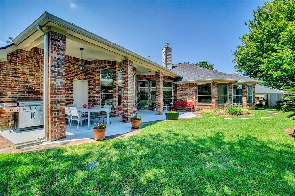 Extended covered patio located off the Living & Breakfast Room.
