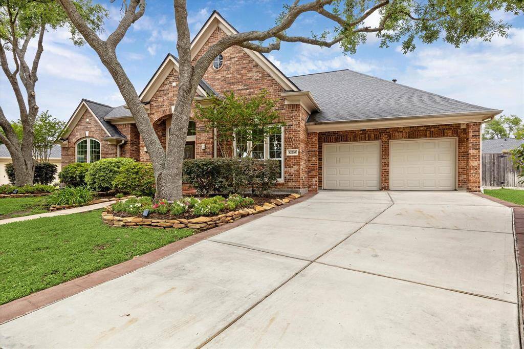 Extra long driveway leads to your 3 car, tandem garage.