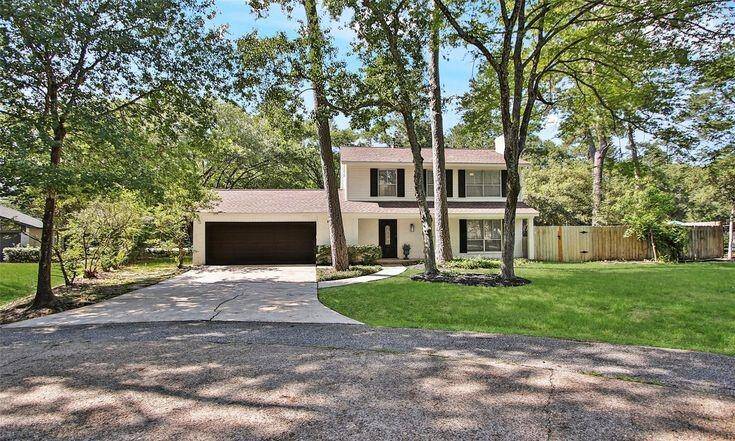 Front Exterior - Wide View Secluded cul-de-sac location with mature trees and long private driveway.