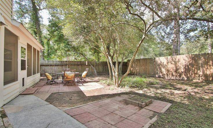 Backyard View 2Fenced yard with plenty of space for entertaining or gardening.