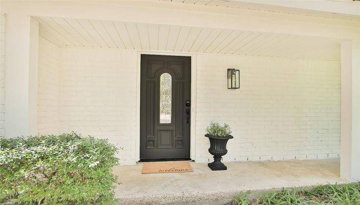 Front PorchCovered front porch with modern lighting and clean entryway.