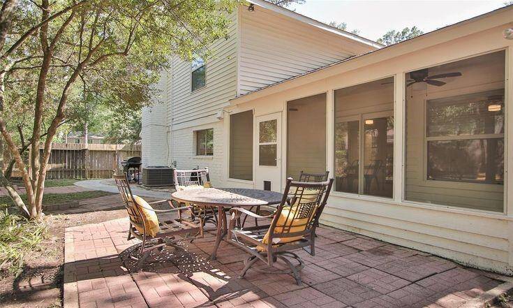 Backyard Patio & Sunroom ViewBrick patio off the sunroom, perfect for outdoor dining and relaxing.