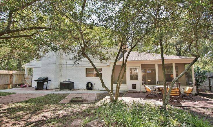 Backyard Facing HomeView of fenced yard and rear elevation, offering privacy and tranquility.