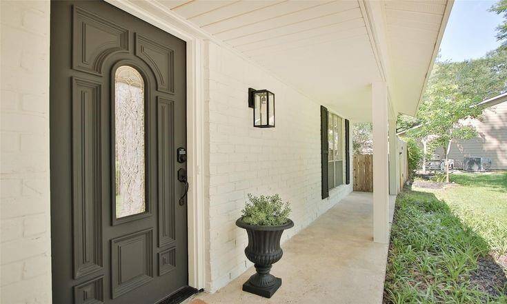 Front Door & Side ViewInviting entrance with updated hardware and front yard views.