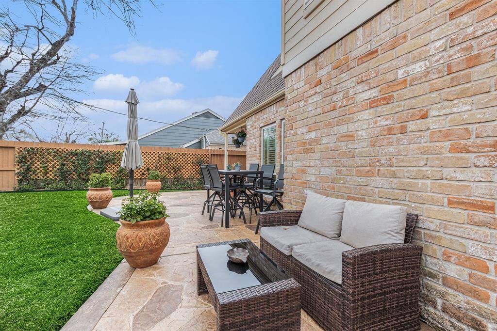 Stamped concrete oversized back patio.  Think of the entertaining you can do in your private backyard.