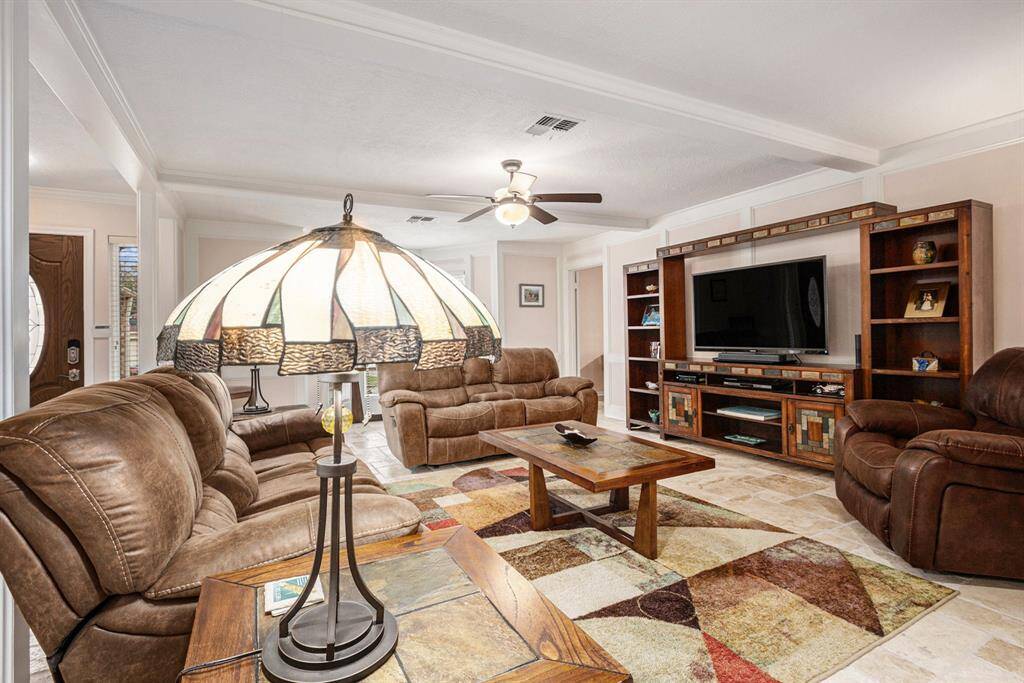 The living area has a cozy feel to be enjoyed in your everyday living and for entertaining guests.