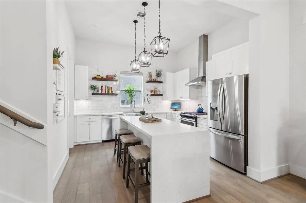 Large open kitchen with plenty of storage and countertop space