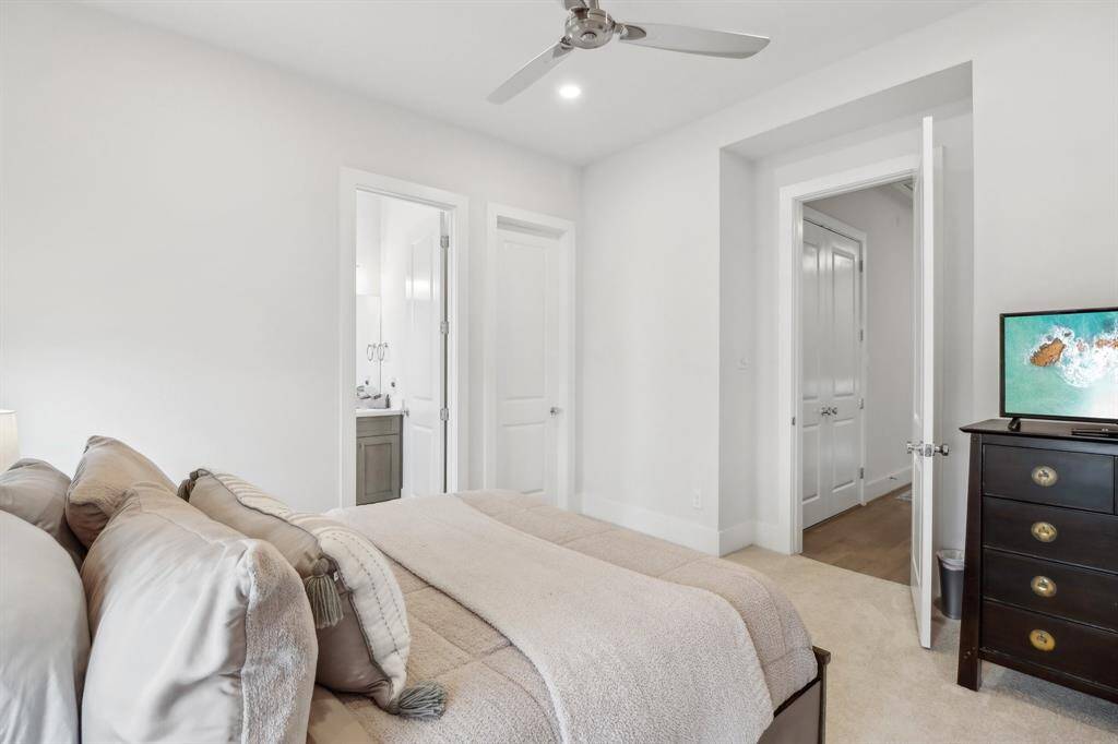 3rd floor secondary bedroom includes walk in closet and full bath