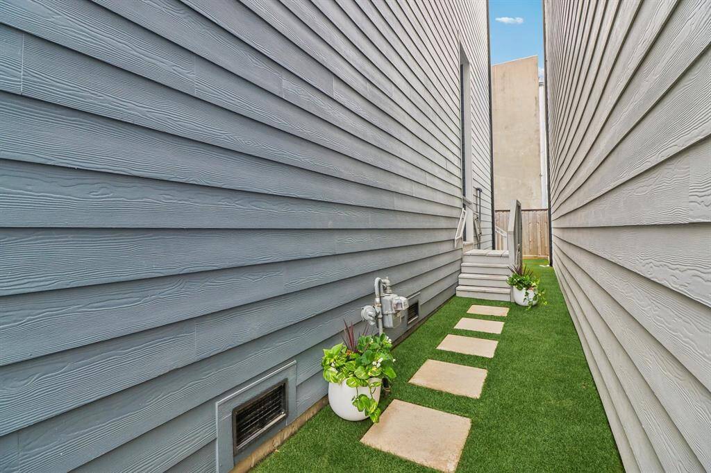 Turfed entry to the home provides not maintainence landscaping
