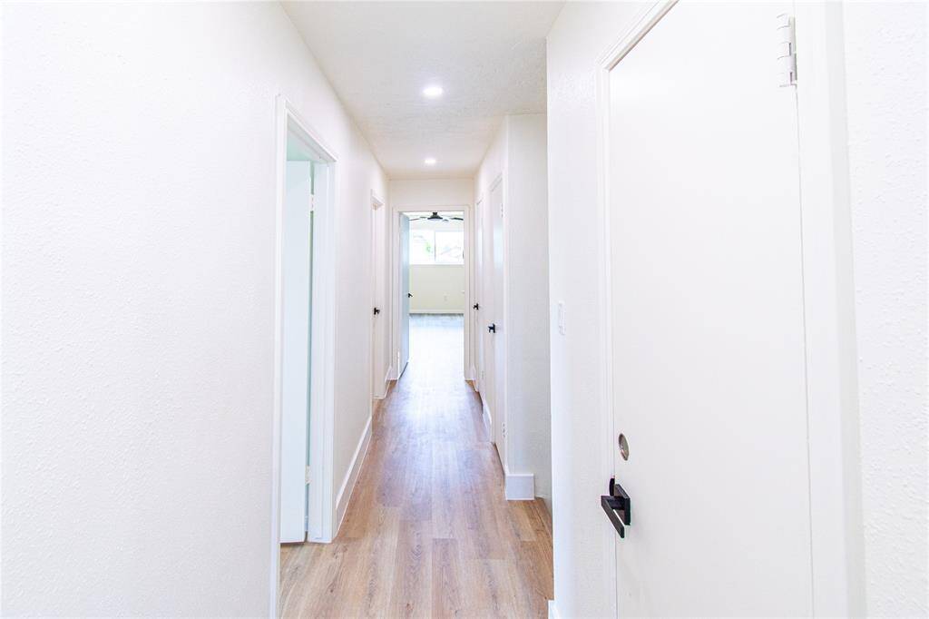 Recessed lighting adds a clean, inviting atmosphere.