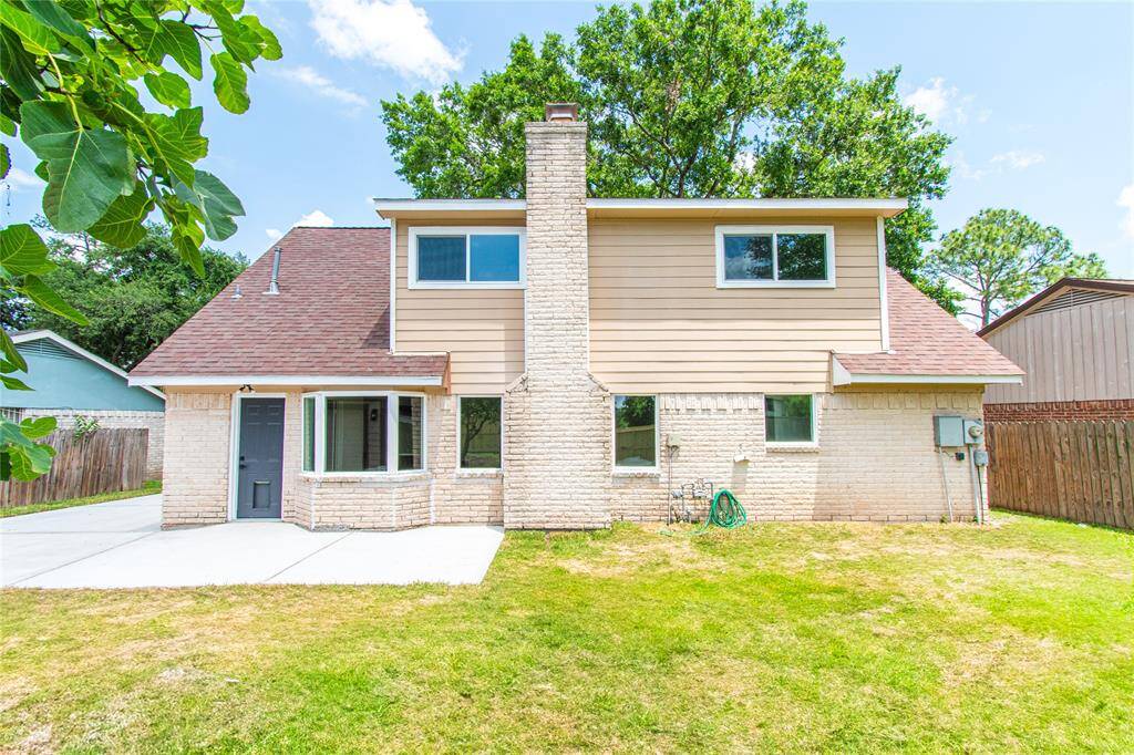 Enjoy outdoor living on a spacious new concrete patio.