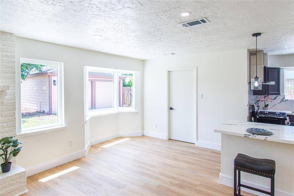 Abundant natural light floods the space, creating a bright and inviting atmosphere.