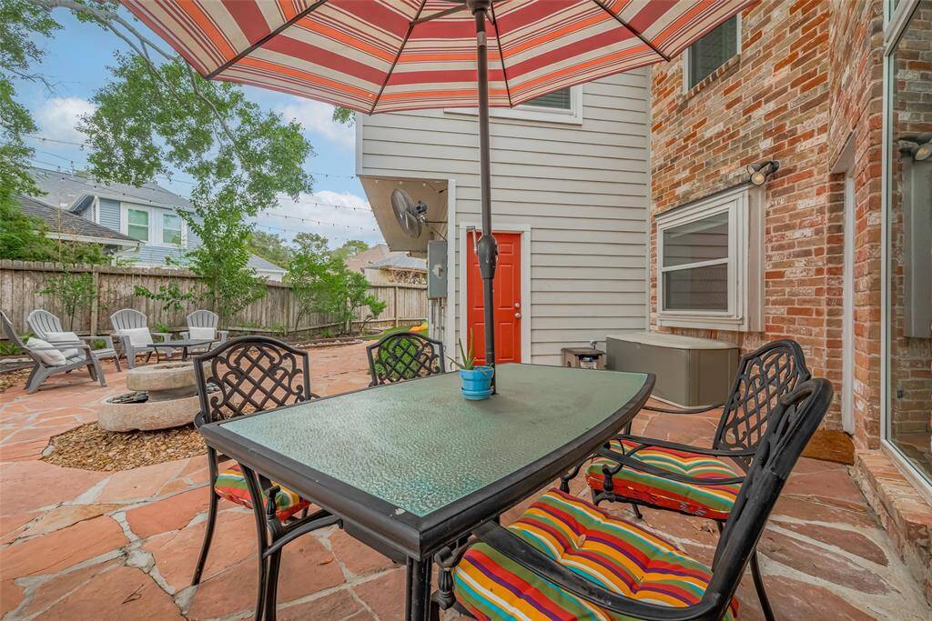 Ample space on the patio invites you to arrange your favorite outdoor furniture—perfect for relaxing, entertaining, or enjoying peaceful moments surrounded by nature.