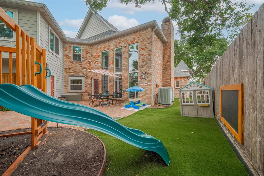 Admire the beautiful brick exterior, enhanced by gleaming windows and well-maintained gutters—offering both timeless curb appeal and functional durability.