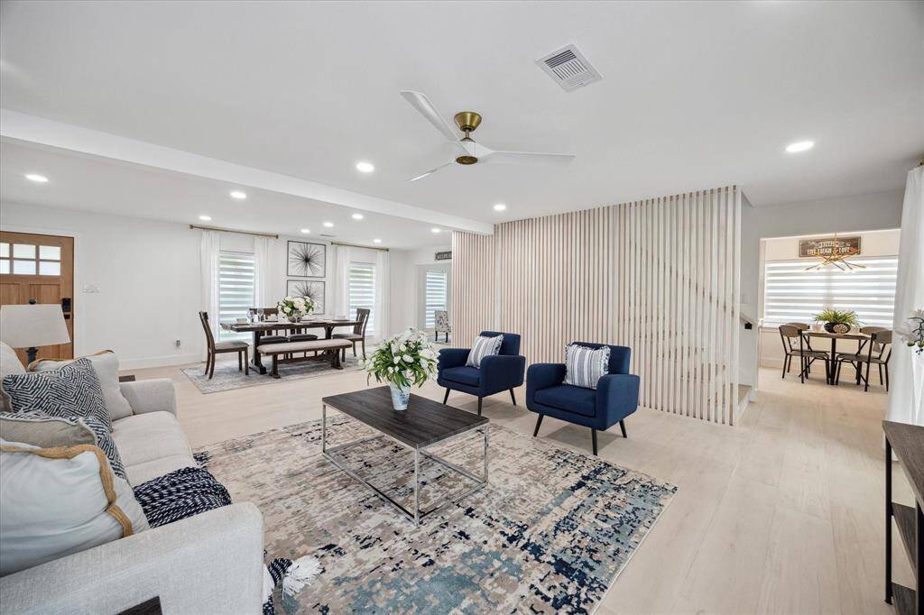 Another angle of the spacious living room reveals even more room to gather, relax, and enjoy.