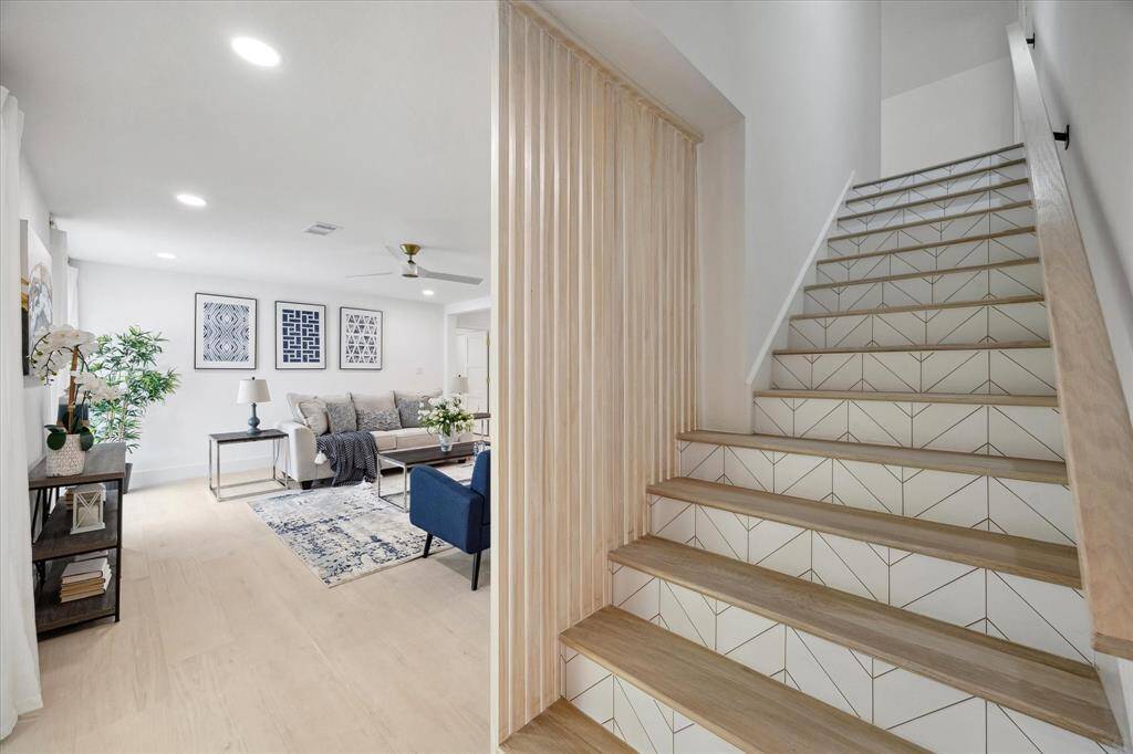 Beautifully detailed stairs lead you to the second floor, offering elegance in every step.