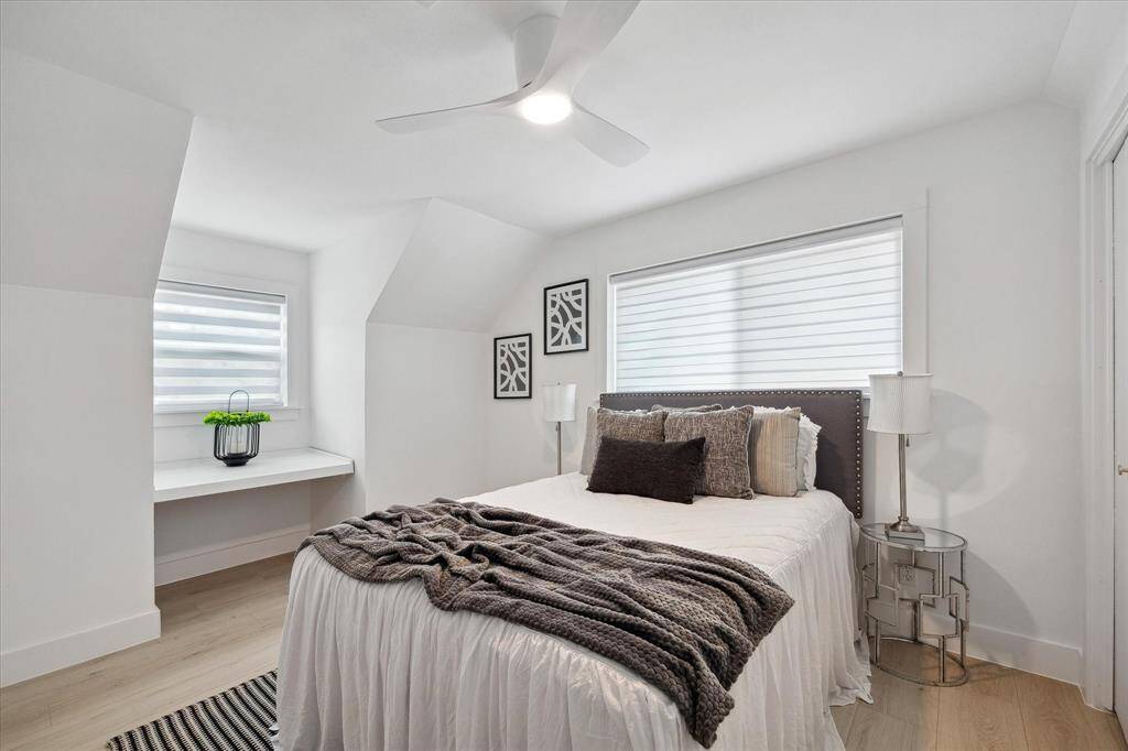 Perfect for study or creativity—a built-in desk space enhances the functionality of this secondary bedroom.