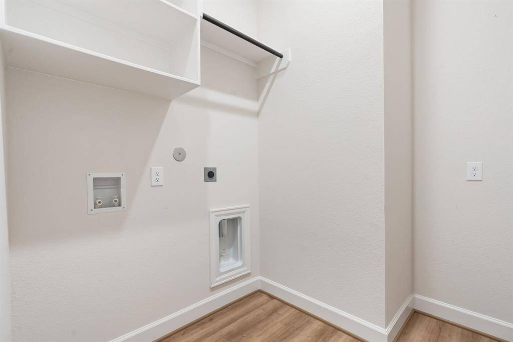 Large laundry room with enough space for your second refrigerator or freezer.