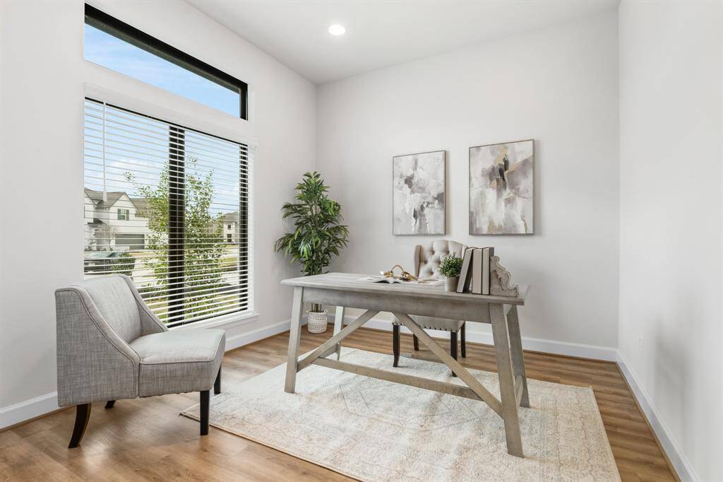 Office with french doors to the left as you enter home.