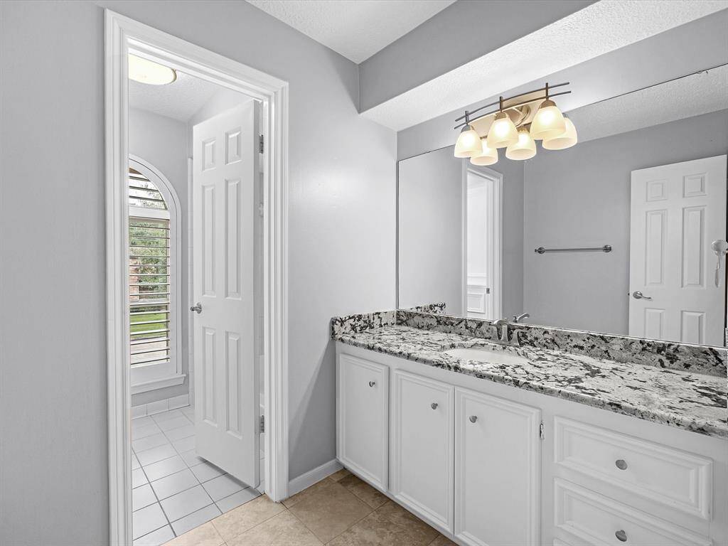 2nd Floor Hall Bath with a Shower/Tub combo, conveniently located between the Game Room and Bedrooms.
