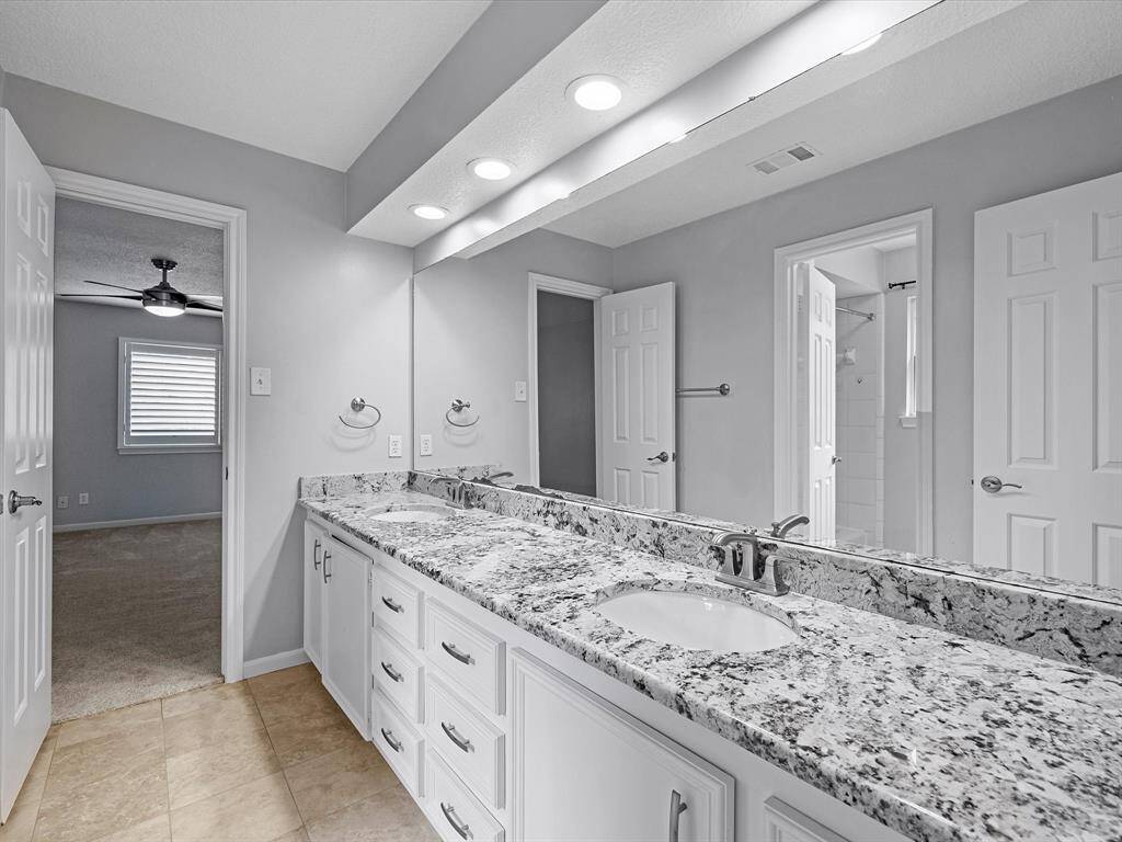 The 2nd floor Jack & Jill Bathroom between Bedrooms 2 and 3.