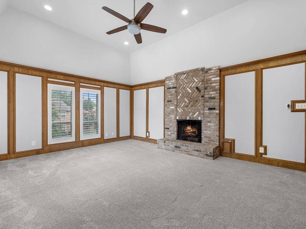 The 2nd floor Family Room with a beautiful fireplace, the ideal room for movie or game nights.