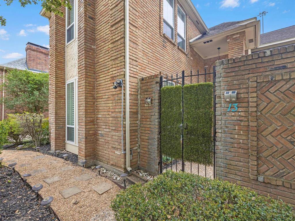 With a generous setback from the curb you and your guests will enter thru beautiful iron gates.